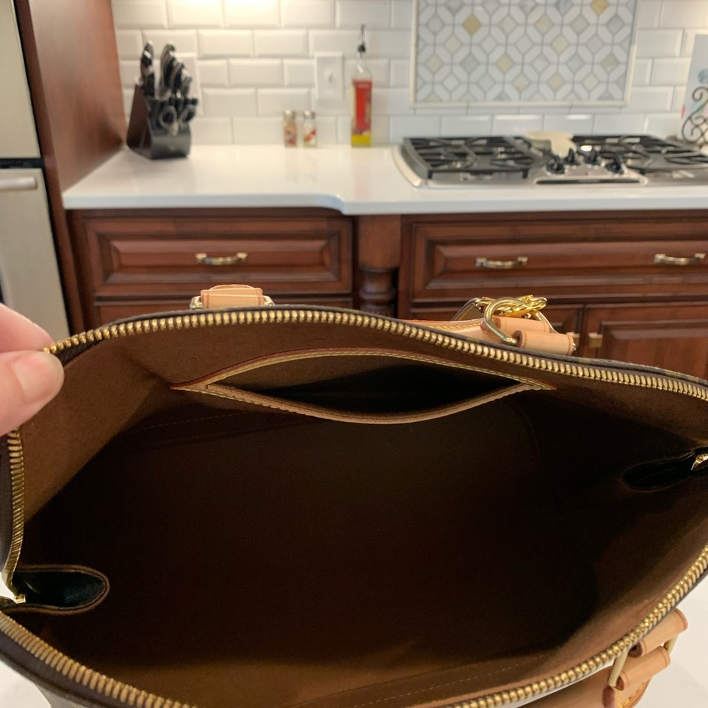 Classic monogram, authentic Louis Vuitton.